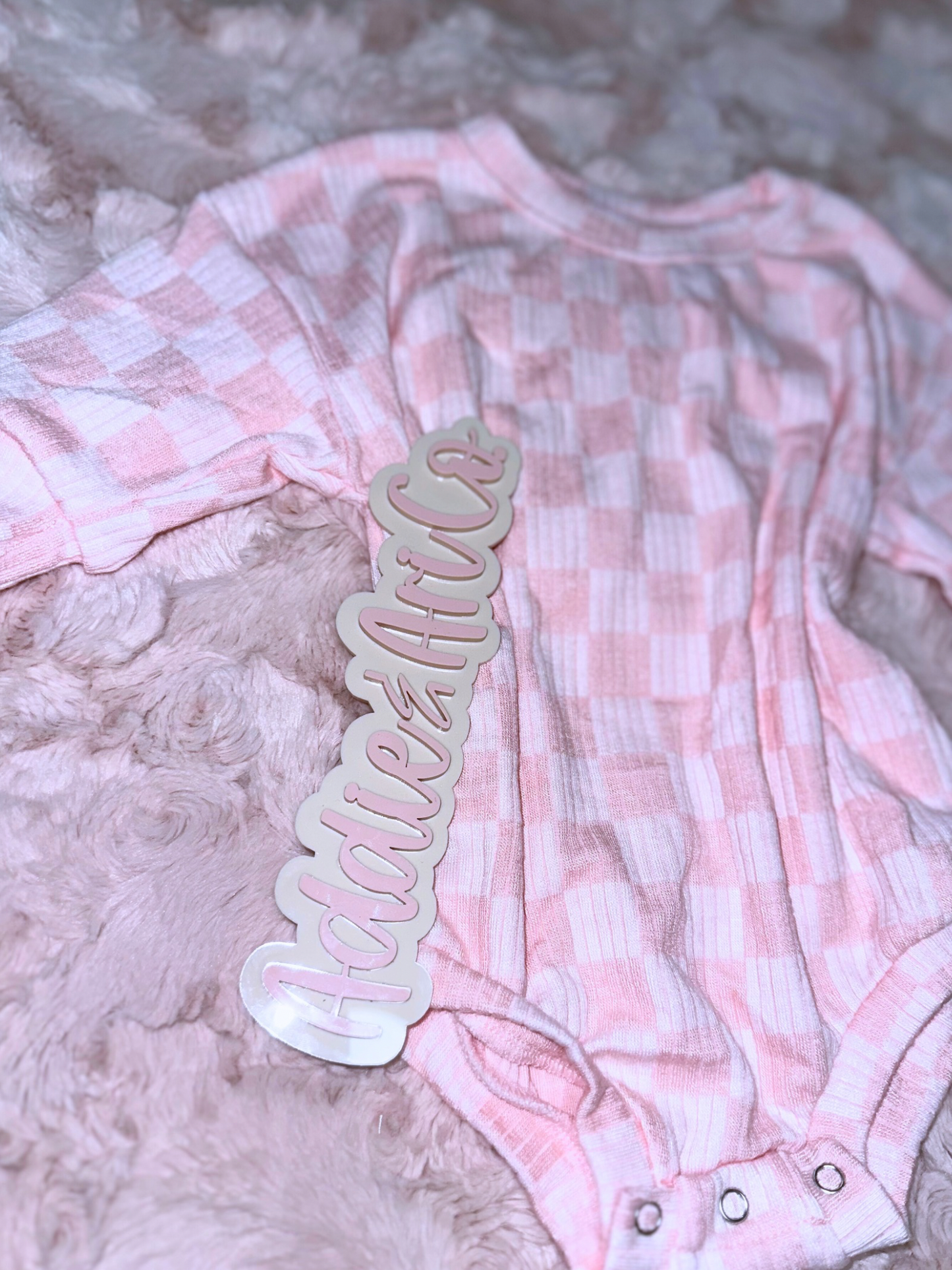 Pink checkered sweater romper